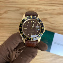 Rolex GMT Master 1675/8 gold, brown dial serviced by rolex
