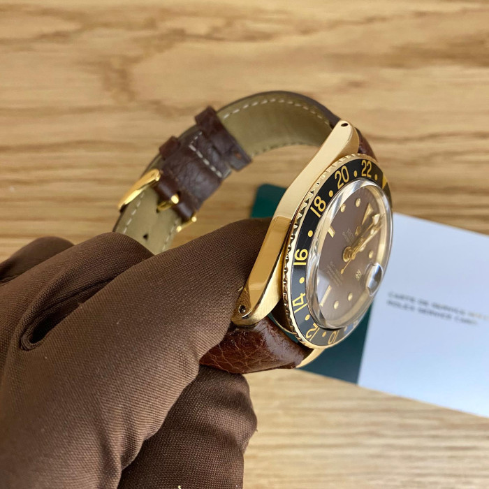 Rolex GMT Master 1675/8 gold, brown dial serviced by rolex