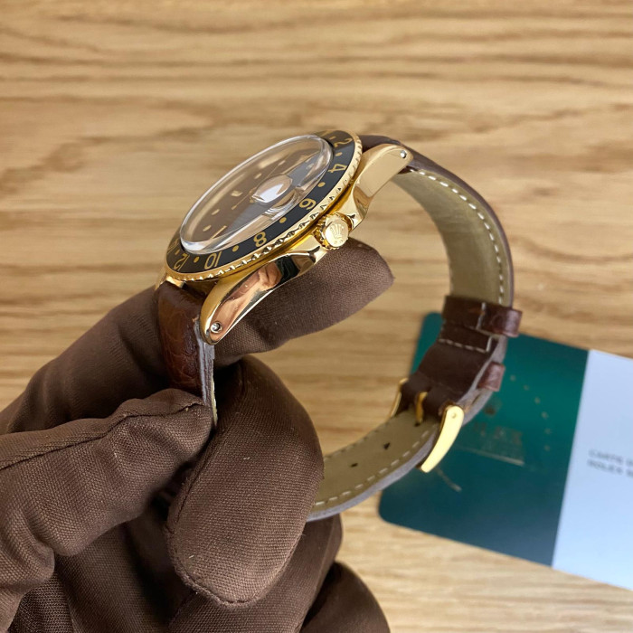 Rolex GMT Master 1675/8 gold, brown dial serviced by rolex