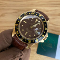 Rolex GMT Master 1675/8 gold, brown dial serviced by rolex
