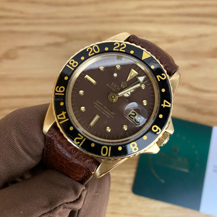 Rolex GMT Master 1675/8 gold, brown dial serviced by rolex